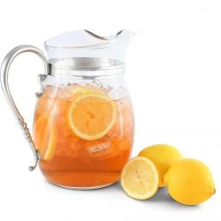 Vagabond House Classic Curved Glass Pitcher Pewter Handle Medici Living