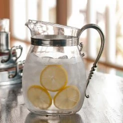 Vagabond House Classic Curved Glass Pitcher Pewter Handle Medici Living